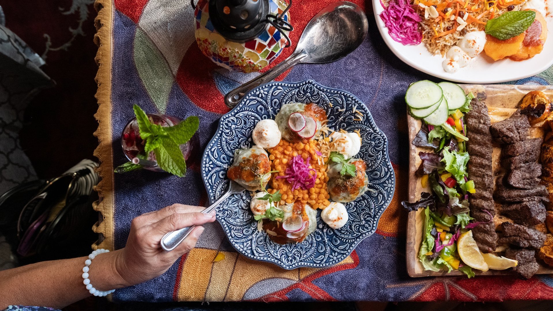 Afghan Kitchen Overhead of table and food Ian Harland DSC 5154