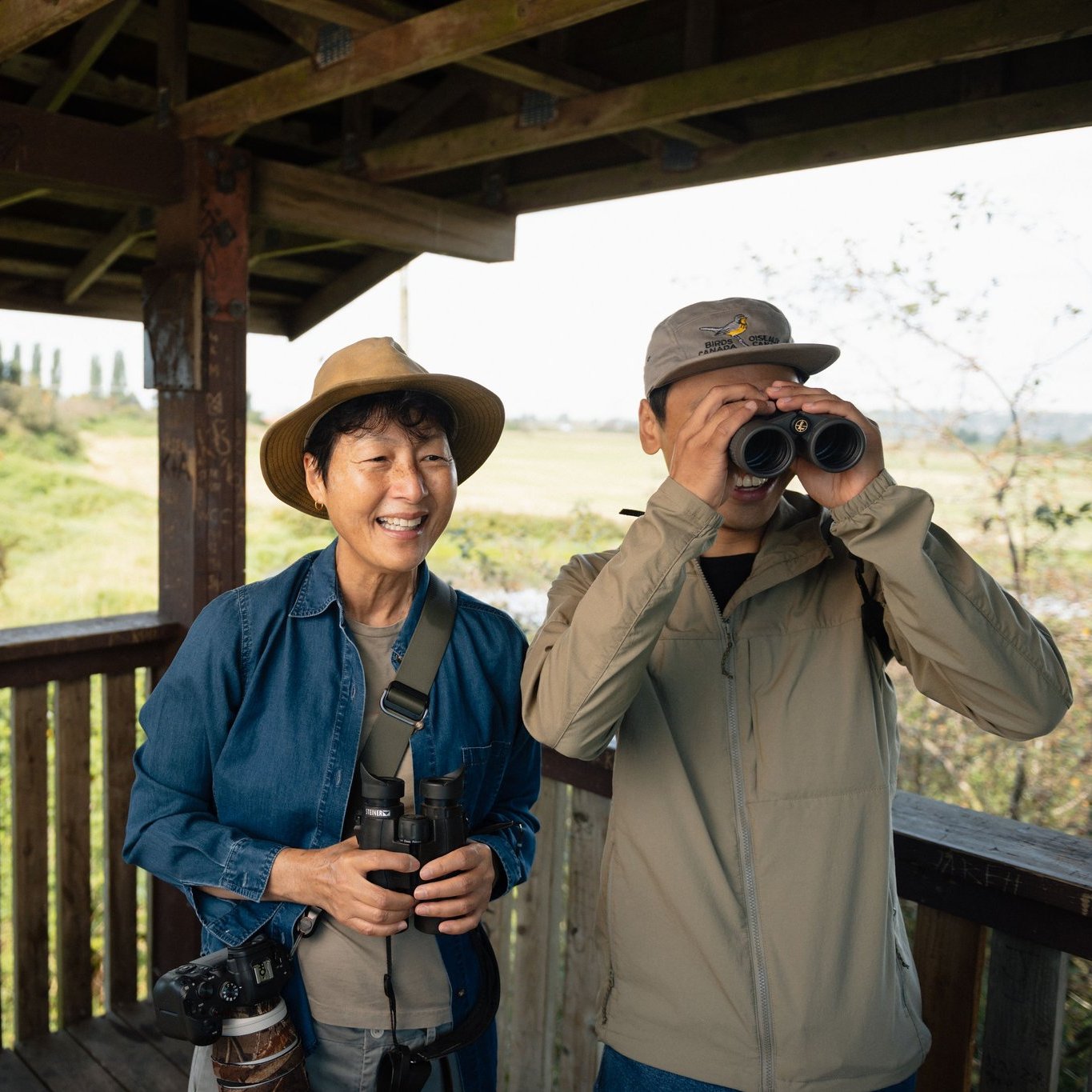 Three birdwatchers in a blind at Serpentine Fen in Surrey BC Ian Harland DSC 6708