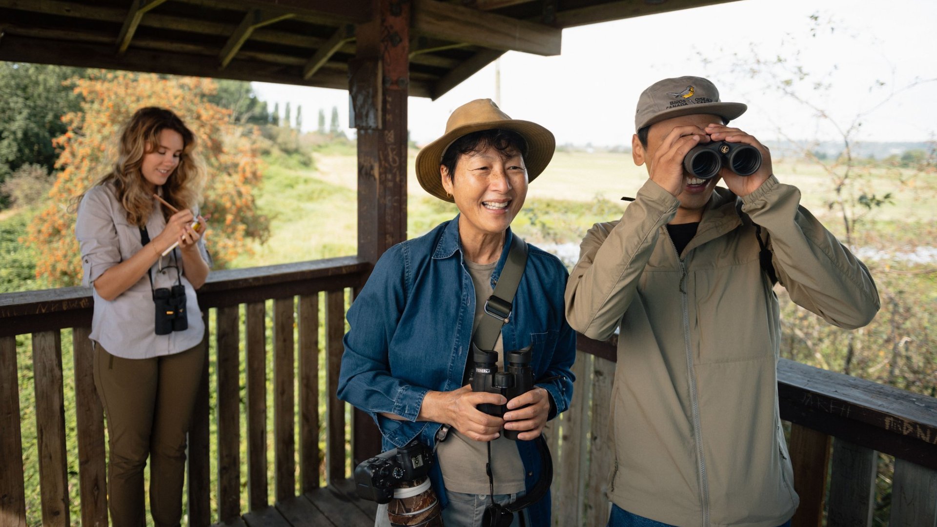 Three birdwatchers in a blind at Serpentine Fen in Surrey BC Ian Harland DSC 6708