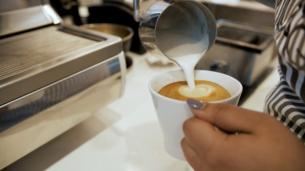 West-village-cafe-surrey latte being poured