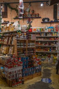 A variety of international foods on display in Greco's Specialty Foods in Newton