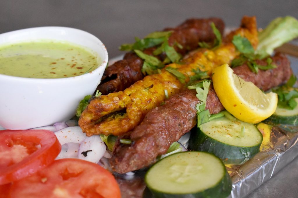 Kebabs with a side of tomatoes and cucumbers from Barney's Karahiwala, Newton. Surrey. Street Food Trail.